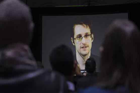 Britain pulls spies as Moscow cracks Snowden files 