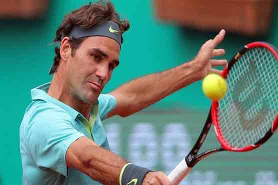 Tennis: Federer advances in Halle after final set tie-break