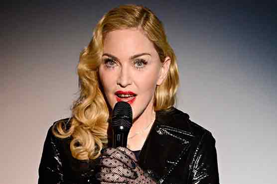Madonna brings star power, children to new video