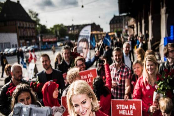 Danish election too close to call, show exit polls