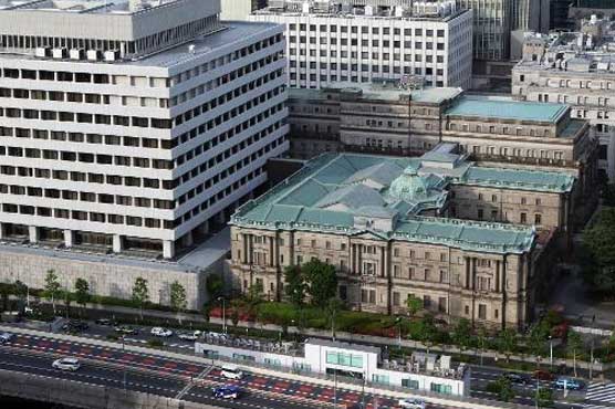 Bank of Japan holds fire on stimulus as economy picks up