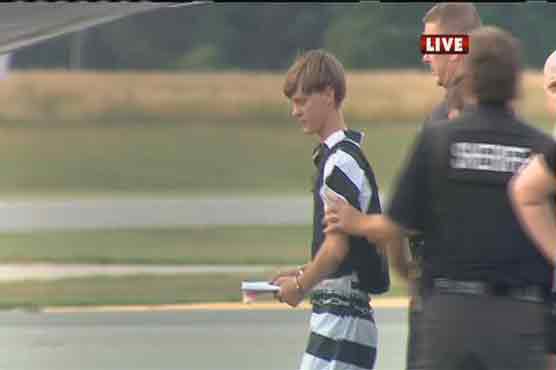 Suspect caught in US black church 'hate crime' rampage 