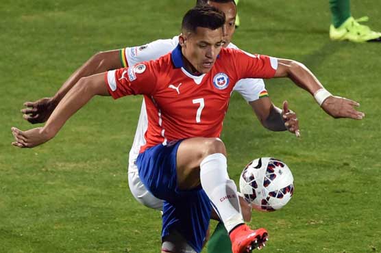 Football: Chile roar into last eight with Bolivia rout