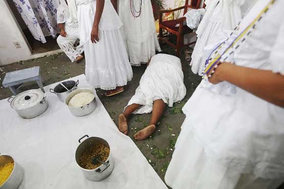 Medium killed, tomb desecrated in latest Brazil attacks