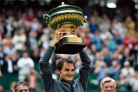 Federer beats Seppi for record 8th Halle title