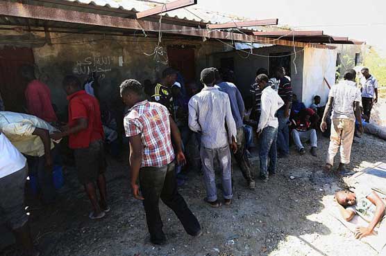 One dead, one injured as migrant boat comes under fire off Libya