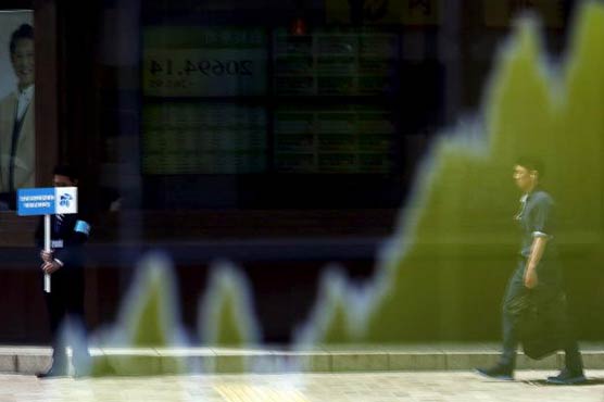 Japan shares clear 18-year peak, dollar firm