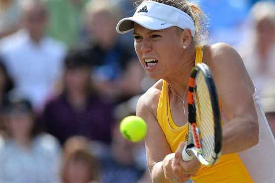 Tennis: Wozniacki into Eastbourne last-eight, Bouchard injured