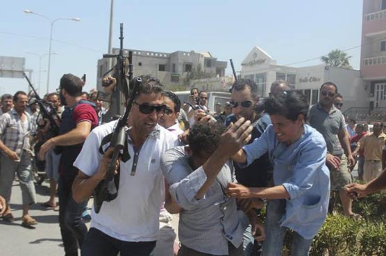 Gunman kills 39 at Tunisian beachside hotel, Islamic State claims attack