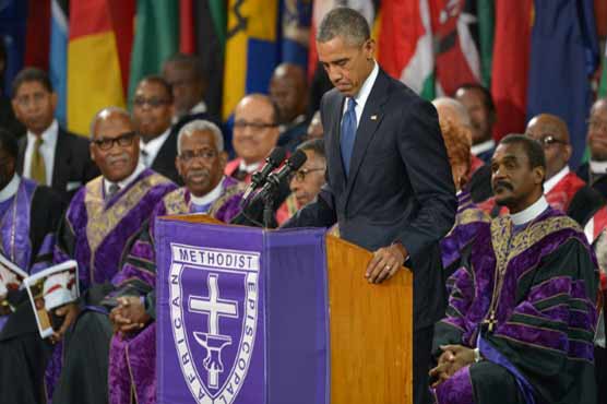 Obama tackles race, guns in eulogy for Charleston pastor 