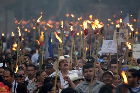 Thousands in anti-corruption march against Honduras president