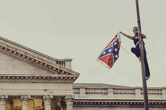 US protester removes Confederate flag from state house 