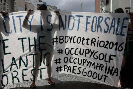 IOC defends Rio legacy amid green protests 