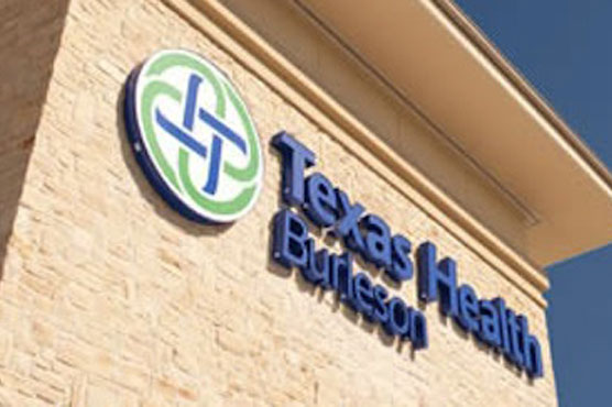 Nurse who survived Ebola sues Dallas hospital system