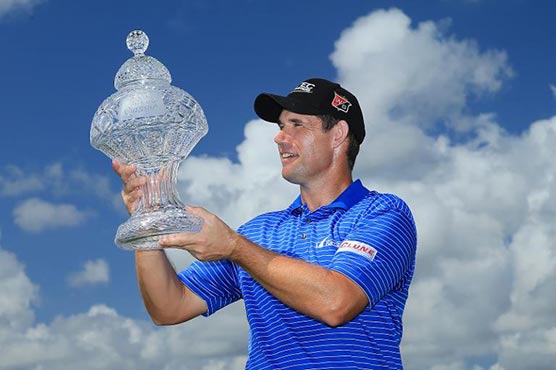 Harrington wins playoff to capture Honda Classic 