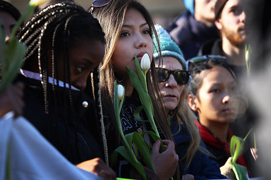 Students march to protest black teen's killing in Wisconsin
