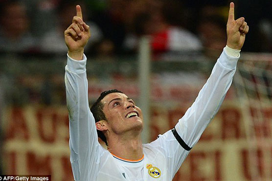 Football: Ronaldo in the record books as Real advance to last eight