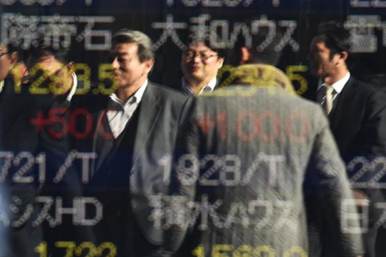 Fed speculation hits Asian markets, dollar rallies