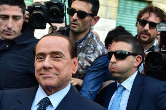 Berlusconi vows comeback after sex case relief
