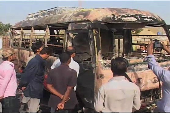 Unknown miscreants torch passenger bus in Karachi