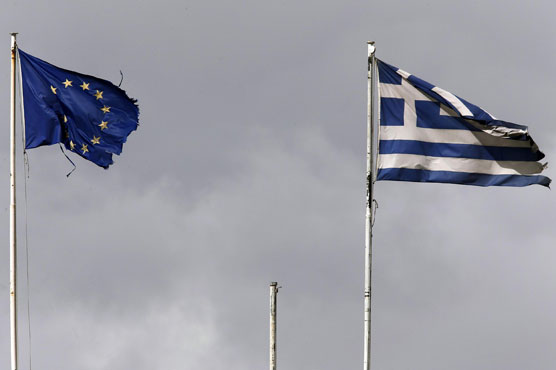 Greek PM promises to keep paying creditors