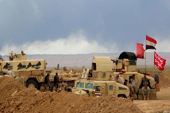 On two fronts, Iraqi forces battle Islamic State for Tikrit