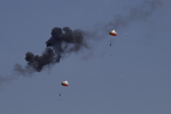 2 Indonesia planes crash at air show practice; pilots safe