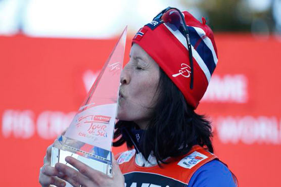 Bjoergen wraps up World Cup season with win in 30K race