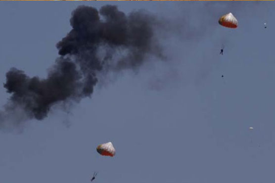 2 Indonesia planes crash at air show practice; pilots safe