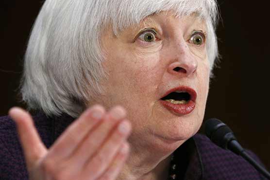 Low wages, high dollar test Fed's patience