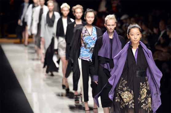 Tokyo Fashion Week opens with petal-strewn labyrinth runway