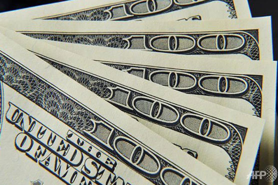 Dollar pulls back after tepid US data