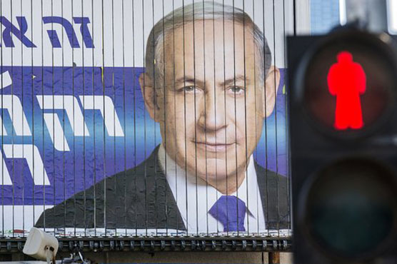 Israelis vote in tight race as Netanyahu fights for survival