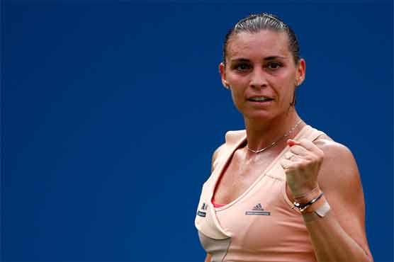 Tennis: Defending champion Pennetta ousts Sharapova