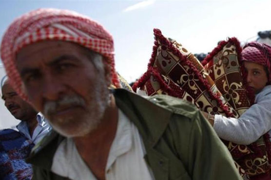 Suicide bomber kills more than 20 at Syria Kurdish festival: monitor