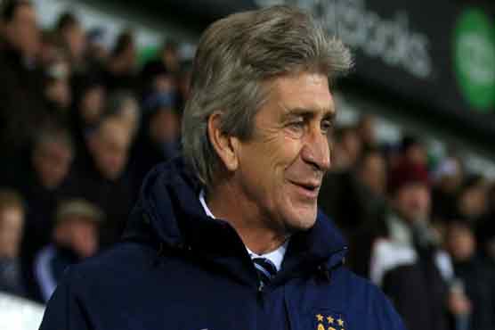Football: Pellegrini vows City will keep fighting for title