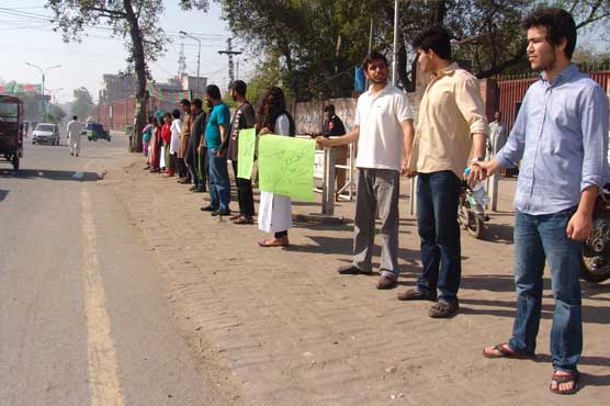 Lets hold hands and stand against terrorism; students made human chain