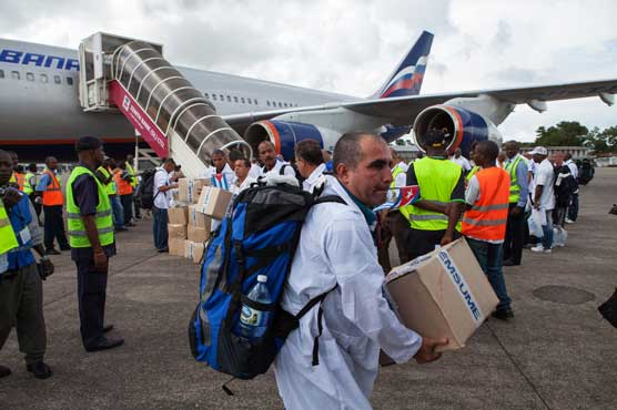 Cuba health workers return home from Ebola fight in WAfrica