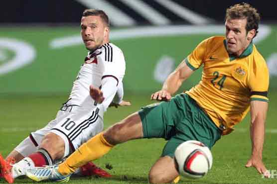 Football: Podolski's late goal dashes Aussie hopes of repeat win