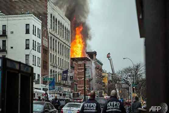Twelve hurt in New York building collapse, blaze