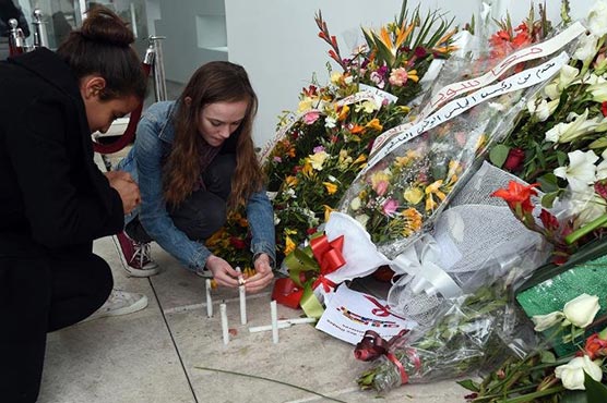 Tunisians march against extremism after museum massacre