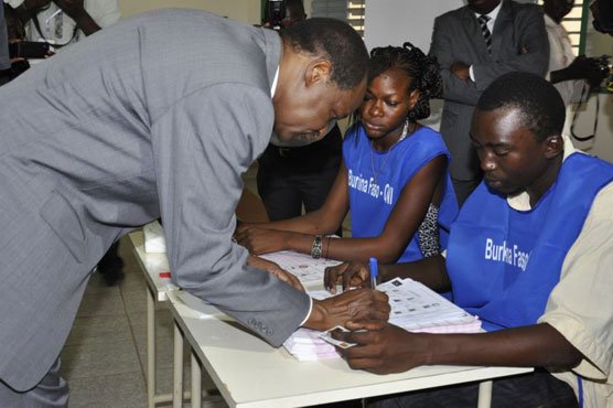 Divided Nigeria city awaits results of tense presidential vote
