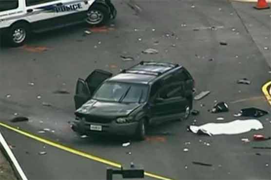 One dead as police fire on car in incident at US spy HQ