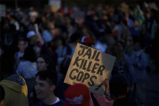 Baltimore mostly calm on third night of curfew