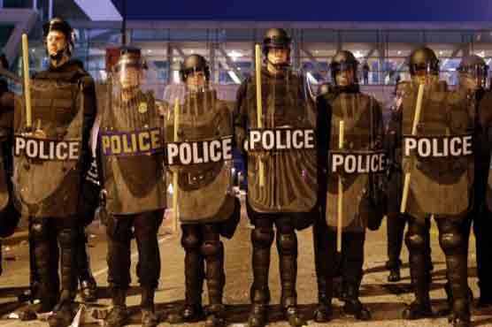 Six Baltimore police officers charged over Gray death