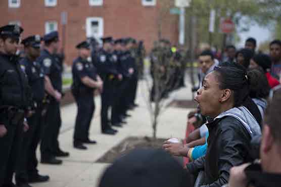 Six Baltimore police officers charged over Freddie Gray death