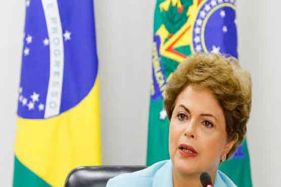 Embattled Rousseff pledges support for Brazil workers