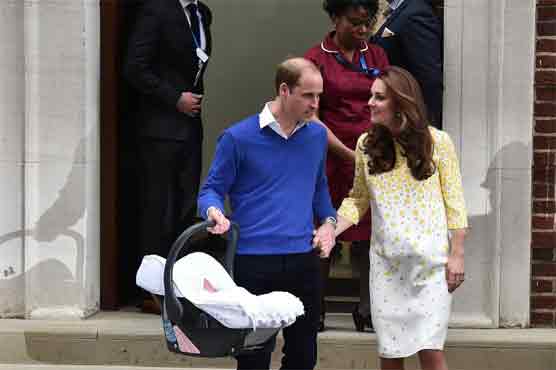 William and Kate back home with Britain's new princess 