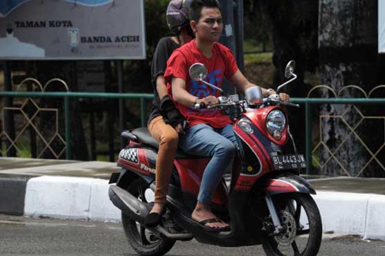 Indonesia: District bans unmarried couples from bike rides