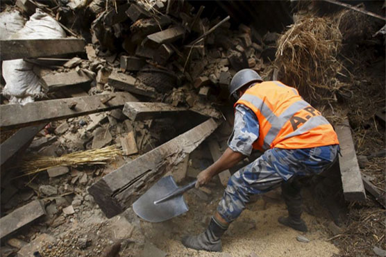 Nepali police dig bodies from village and trekking route